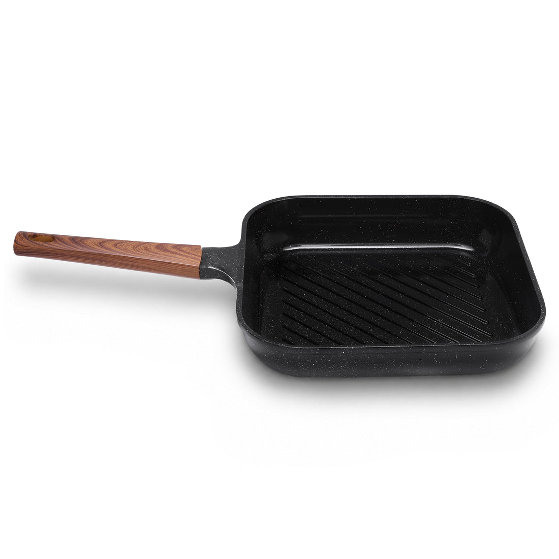 Granova black non-stick grill pan 28 cm cooking grilled food in a modern kitchen