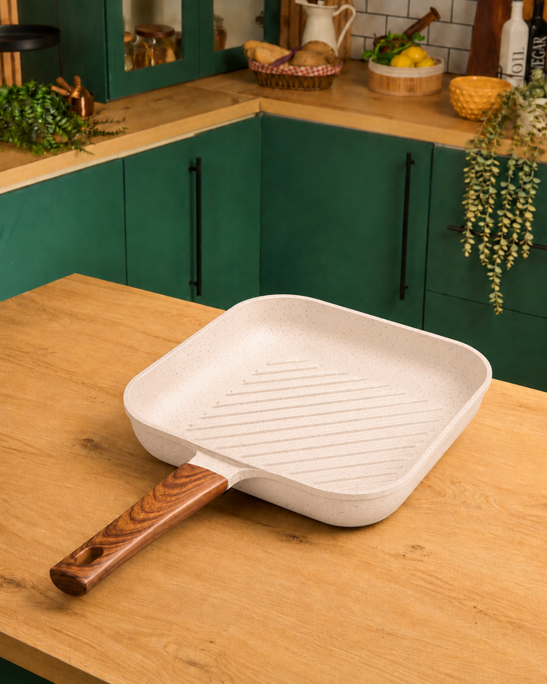 Granova cream non-stick grill pan 28 cm cooking grilled food in a modern kitchen