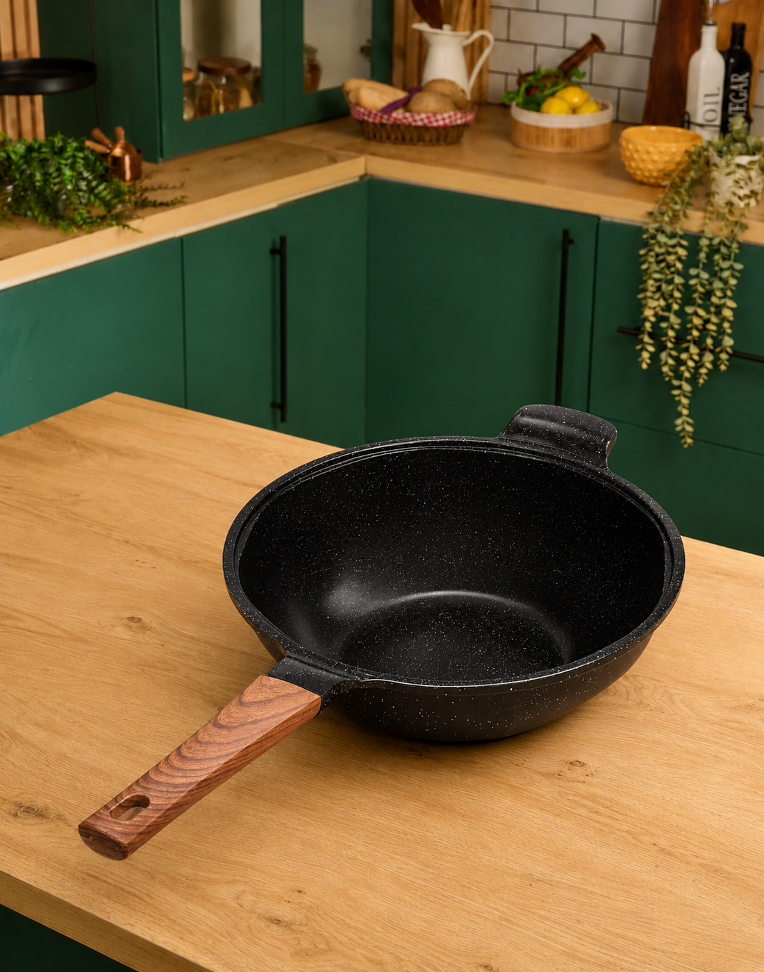 Granova black non-stick wok 28 cm cooking vegetables in a modern kitchen