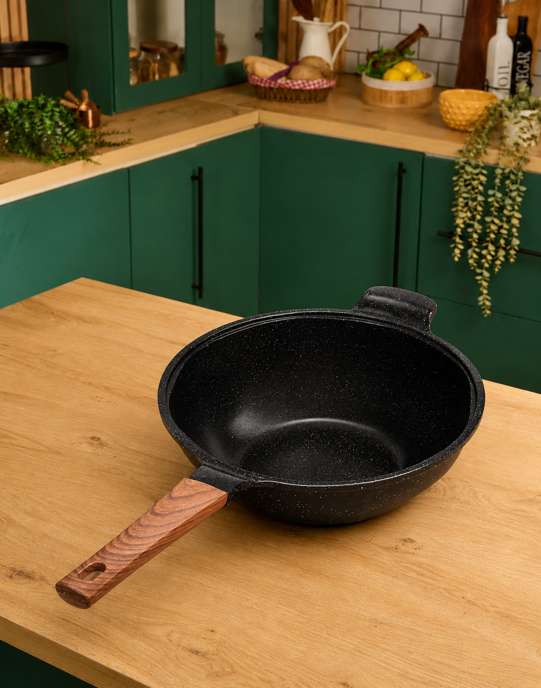 Granova black Wok Pan 28 cm displayed empty in a modern kitchen