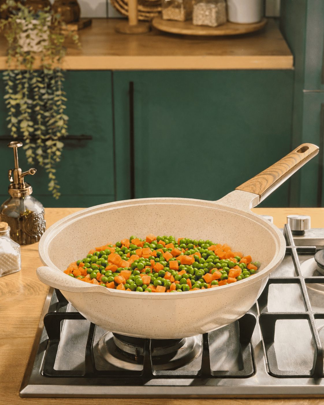 Granova cream Wok Pan 28 cm cooking vegetables on a stovetop